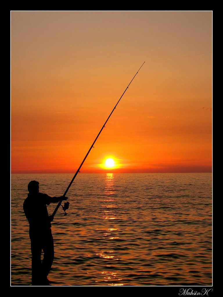 balıkçı ve gün doğumu
